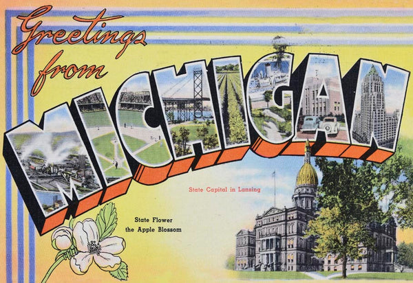 Historical postcard with stylized text that reads “Greetings from Michigan State Capital in Lansing State Flower the Apple Blossom.” The design features an exterior shot of the state capitol building, a drawing of an apple blossom, and various city and landscape scenes within the block letters of “Michigan.” The design is on a yellow background with blue stripes.