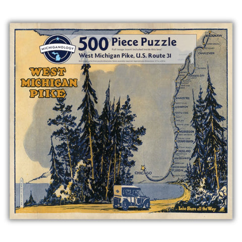 Graphic design featuring an automobile driving on a curved road next to a lake with tall trees around it. The background shows a map of cities along the western coast of Michigan. The design’s colors are muted blues, yellows, and grays. Puzzle cover text reads “500 Piece Puzzle Full Image Insert Included inside this box! West Michigan Pike, U.S. Route 31 Box image varies from puzzle dimensions. Some assembly required. Approximate dimensions: 17 in. x 24 in.”