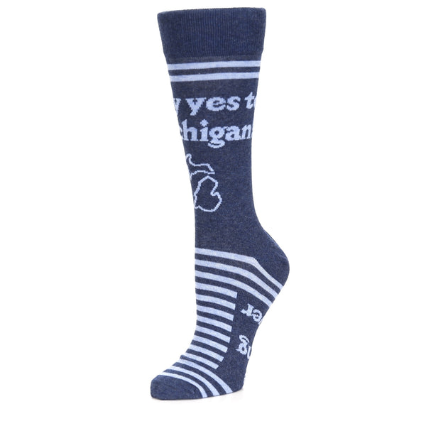 Side view of a crew-length sock featuring the text “Say yes to Michigan” with an outline of the state of Michigan underneath it. The sock is navy blue and light blue and has stripes on the foot and near the cuff.