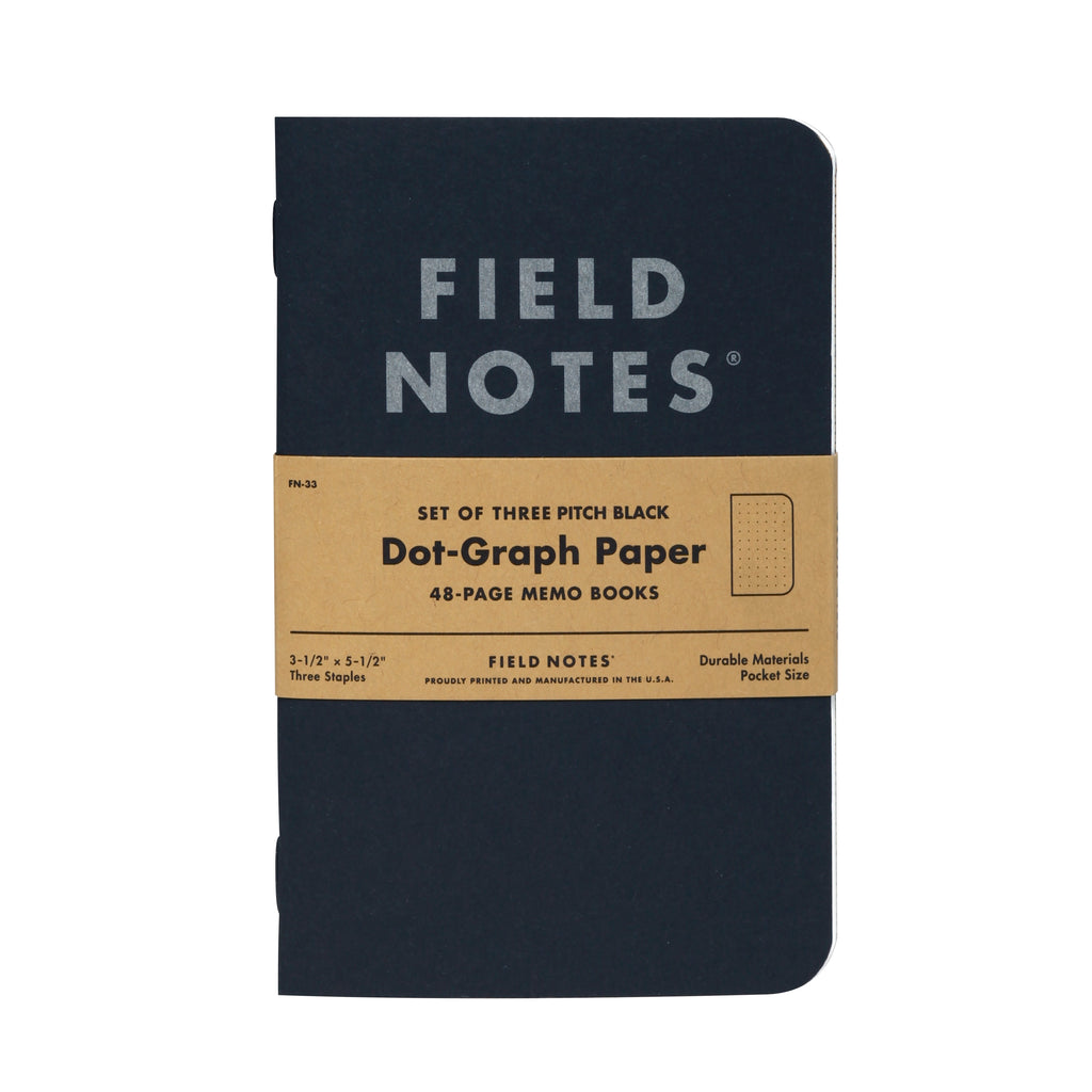 Front of Field Notes Pitch Black notebook with packaging label that reads “Set of Three Pitch Black Dot-Graph Paper 48-Page Memo Books”