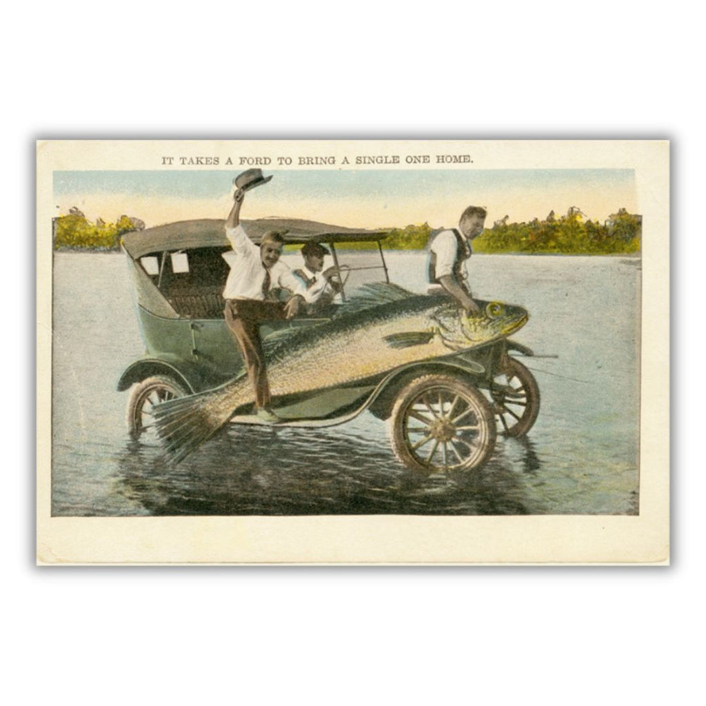 A historical postcard showing three men riding a Ford car on the water carrying a giant fish. Text on the top reads “It Takes a Ford to Bring a Single One Home”