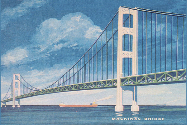 Front of a historical postcard featuring the Mackinac Bridge with a ship in the water below it.