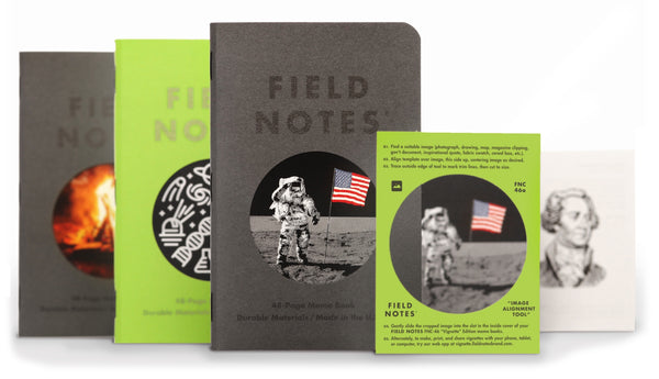 Front of two black and one green Field Notes Vignette notebooks with examples of images in the front window.