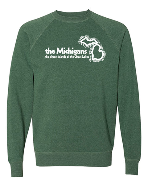 A green crewneck sweatshirt with a white logo on the chest that reads “The Michigans the almost islands of the Great Lakes” with an outline of the state of Michigan.