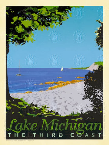 Lake Michigan shoreline including trees, sand, and water. Two sailboats are near the shore. Sand dune is on the back right of image.